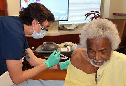 William Swinton, a U.S. Navy Veteran and Community Living Center resident, was the first Veterans to receive the Moderna COVID-19 vaccine at the Ralph H. Johnson VAMC on Dec. 22, 2020. 