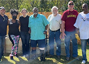 Navy Veteran, John Simpson, center, stands with the volunteers in front of the newly built raised garden bed Oct. 22, 2021 (Courtesy Photo).