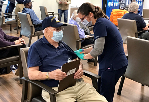 98-year-old WWII Veteran John Dempsey receives with COVID-19 vaccination at the North Charleston VA Outpatient Clinic on Feb. 1, 2021. 